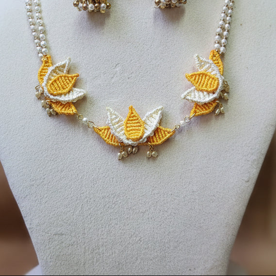 floral jewellery for sangeet lotus necklace set yellow jewellery pearl necklace jhumka earrings maang tikka for wedding party wear necklace set macrame