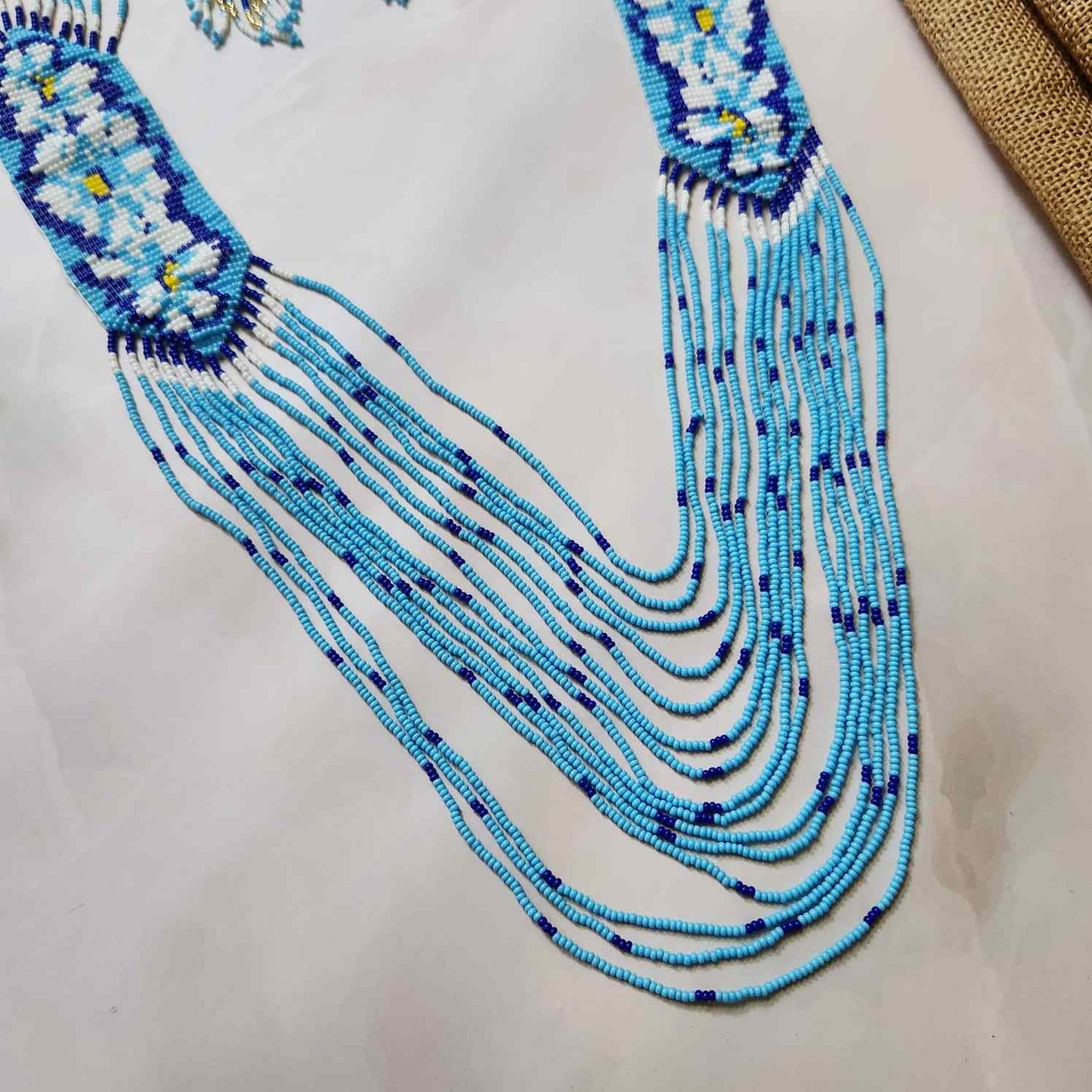 blue floral necklace layered bead necklace for party dangler earrings for office wear haldi wedding wear necklace set