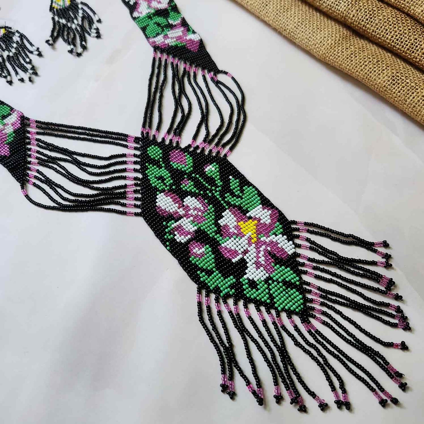 black purple hibiscus floral necklace layered bead necklace for party dangler earrings for office wear haldi wedding wear necklace set