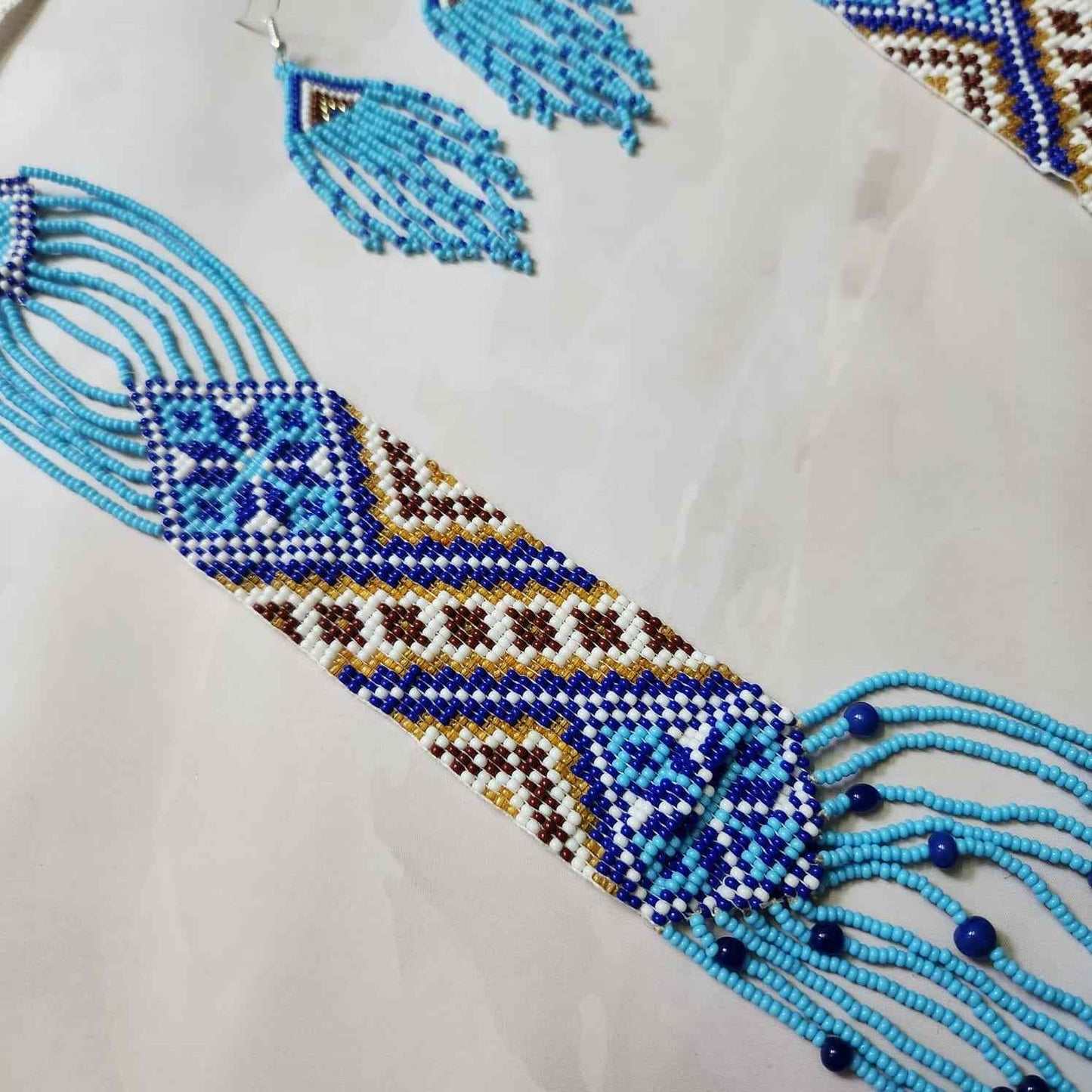 blue geometric necklace layered bead necklace for party dangler earrings for office wear haldi wedding wear necklace set