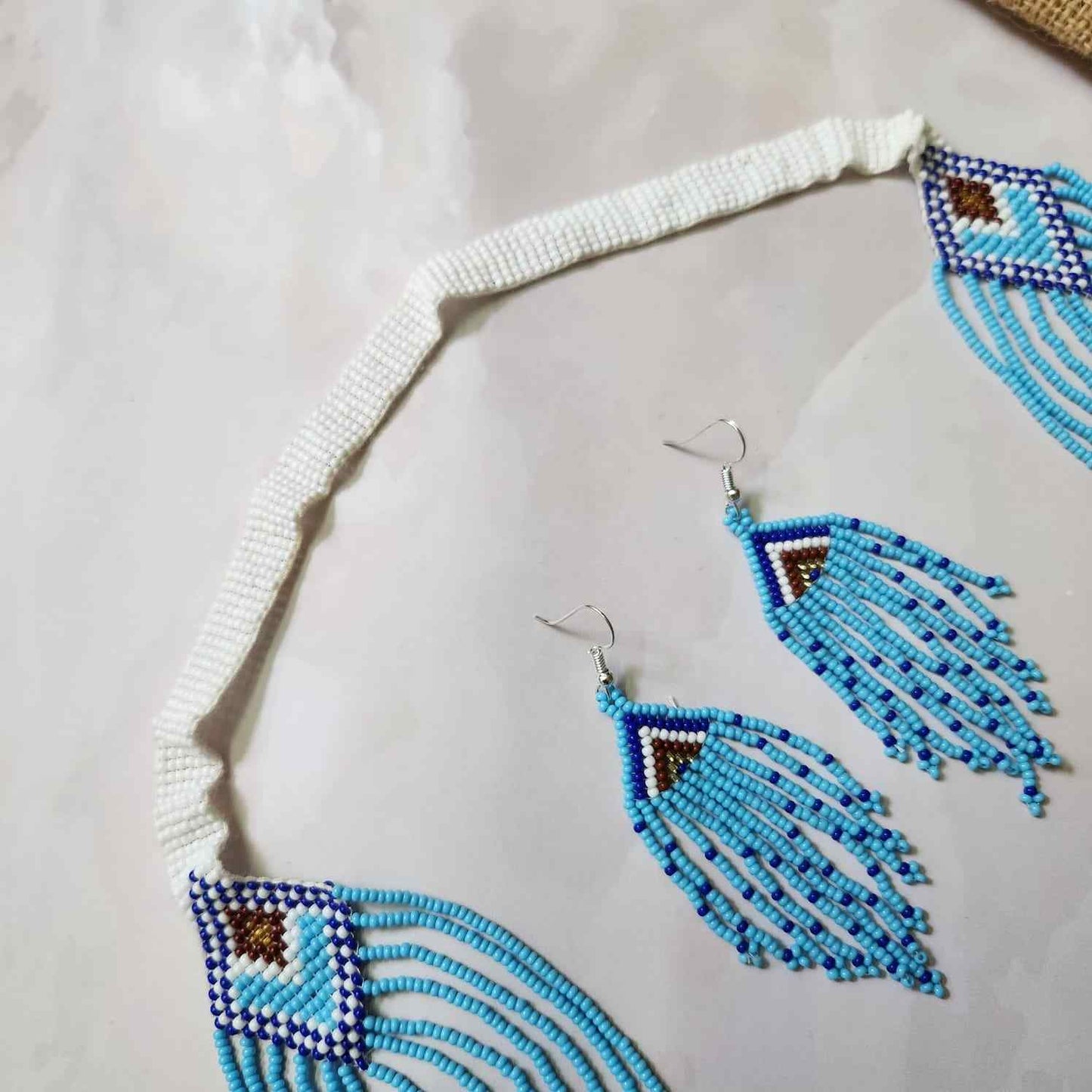 blue geometric necklace layered bead necklace for party dangler earrings for office wear haldi wedding wear necklace set