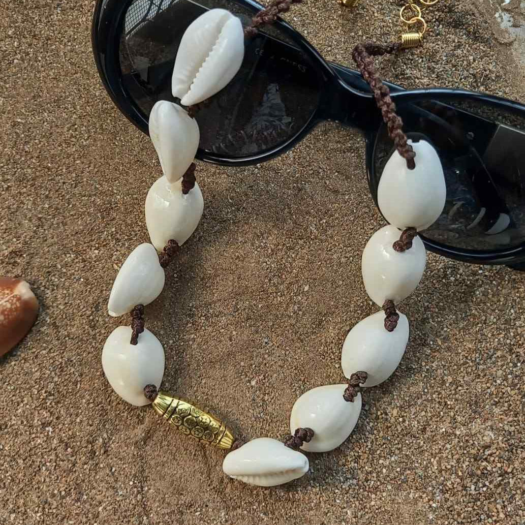 cowrie shell jewellery necklace with gold focal bead