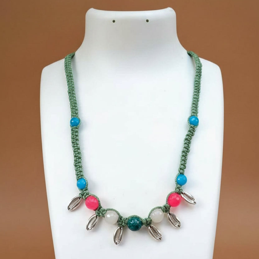 Kaparda silver cowrie macrame statement necklace