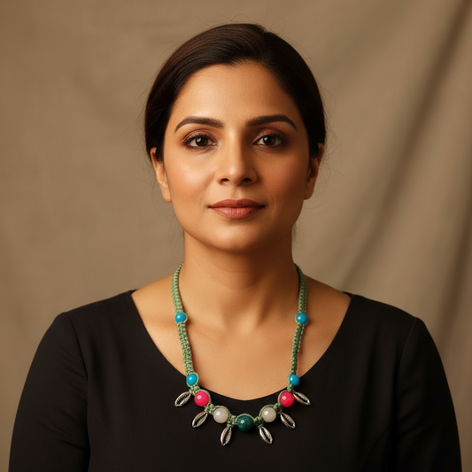 Kaparda silver cowrie macrame statement necklace