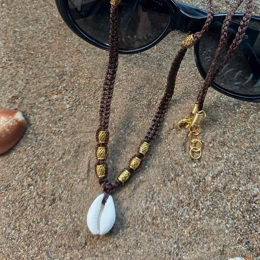 cowrie shell and gold bead necklace