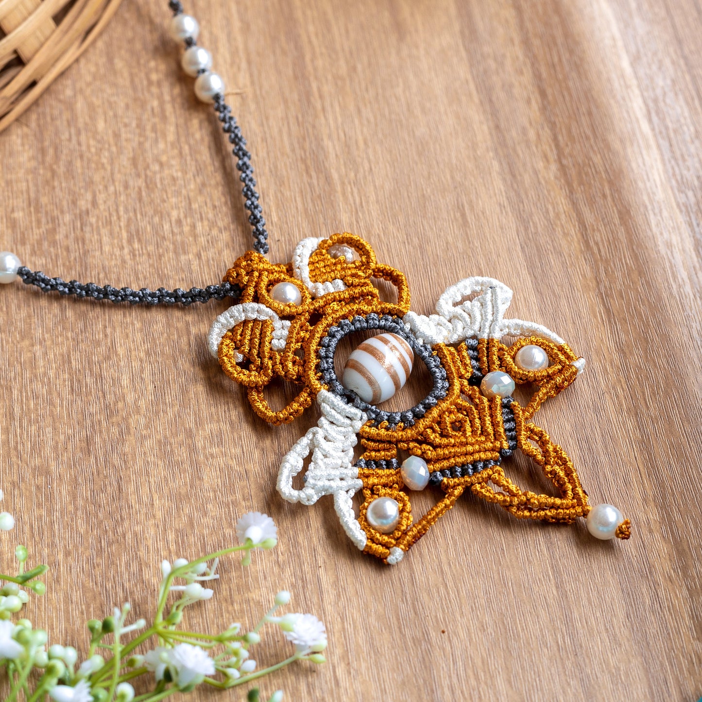 macrame statement necklace with a handmade lampwork bead center