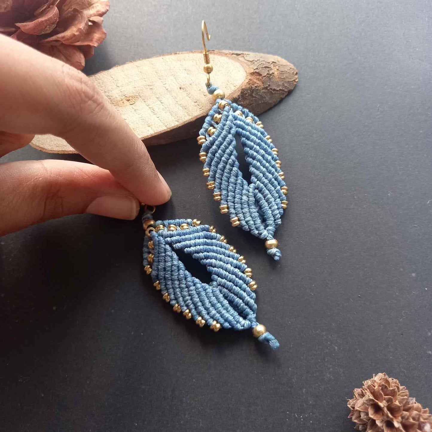 blue leaf like macrame earrings with brass beads