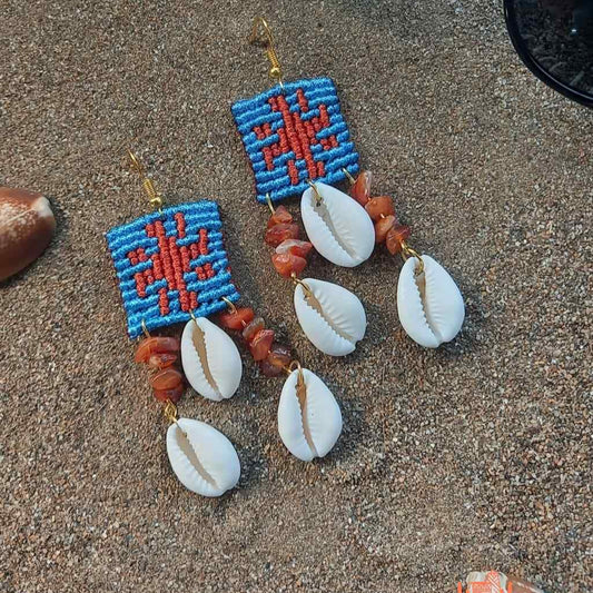 cowrie shell earrings with onyx beads and cavandoli sun motif