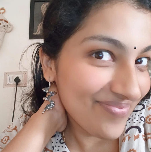 macrame bead earrings in spiral shape with silver beads office wear earrings