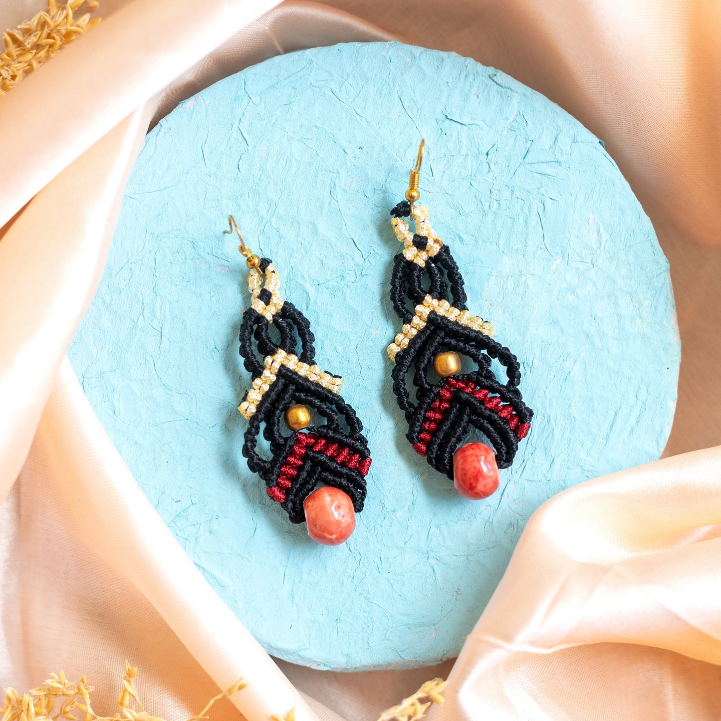 macrame dangler earrings in two colours with ceramic beads