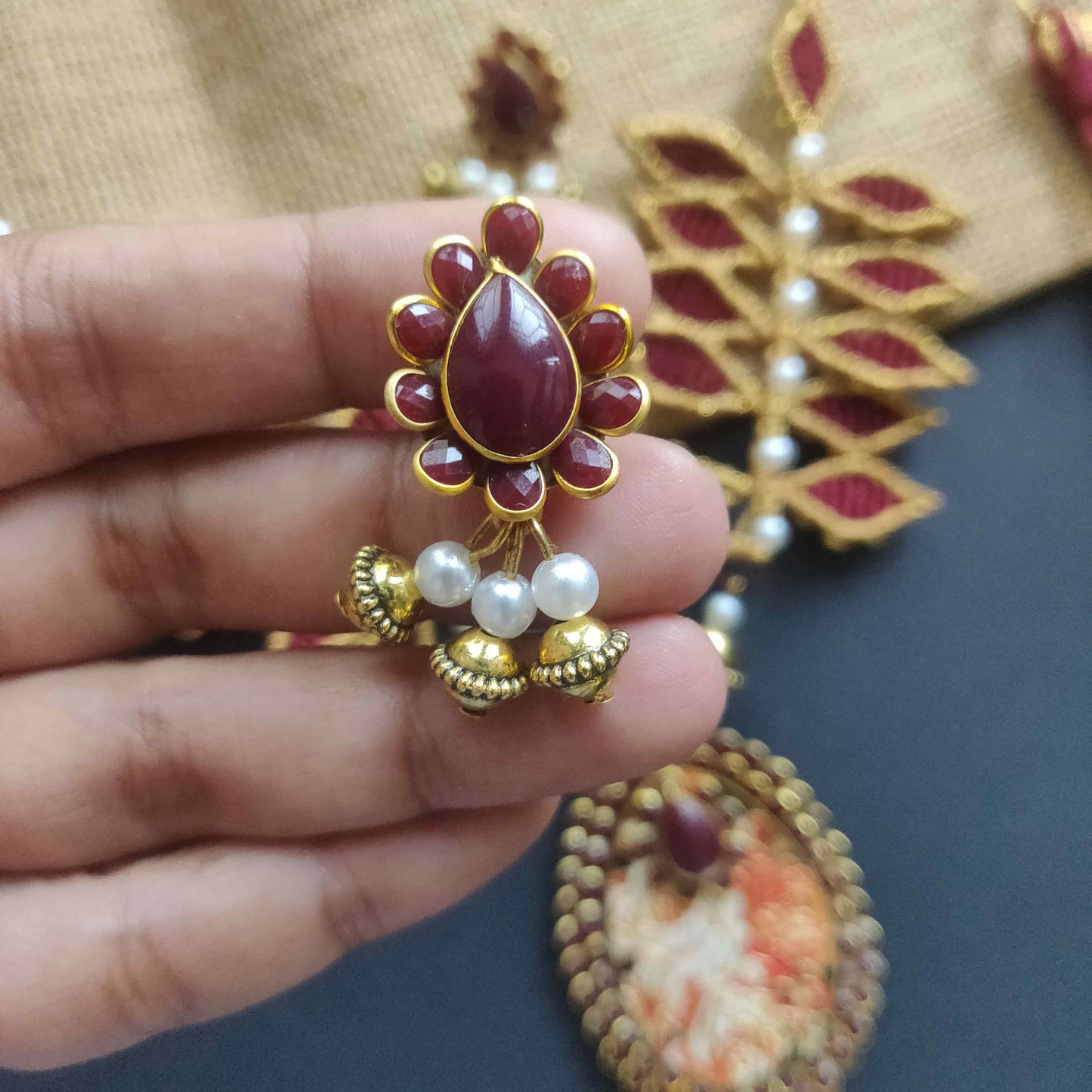gold necklace leaf necklace set traditional gold necklace set maroon necklace set stud earrings drop pendant oval pendant set