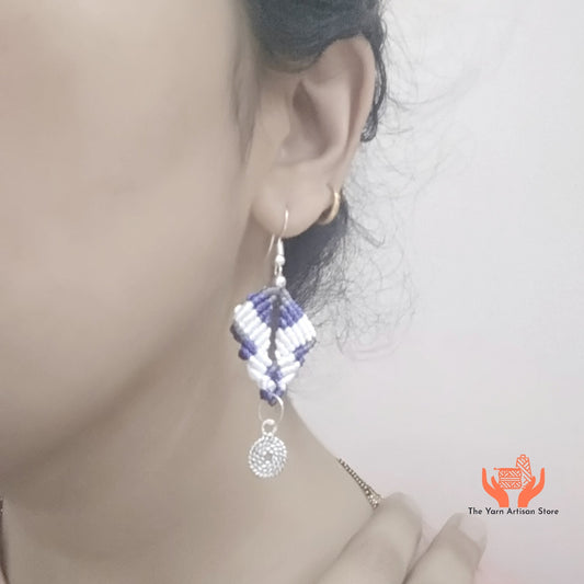 diamond shaped macrame earrings in three colours with a coil of rope charm