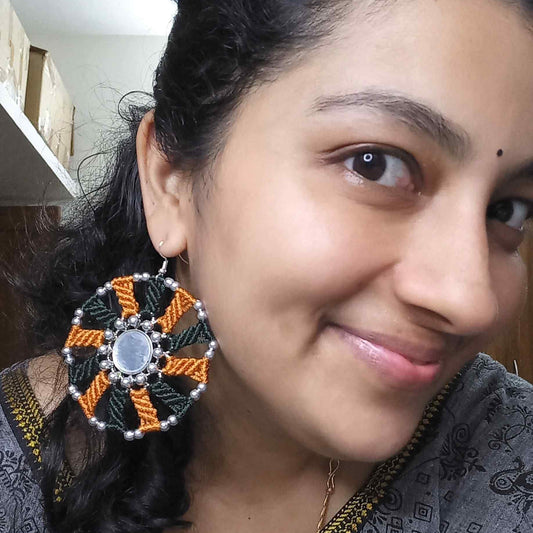 silver mirror earrings with macrame work in dark green and mustard