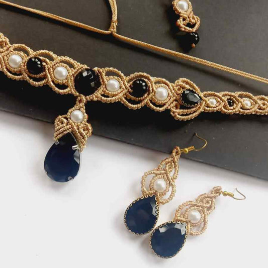 beige and black macrame choker earrings set with black beads and white pearls and black rhinestones