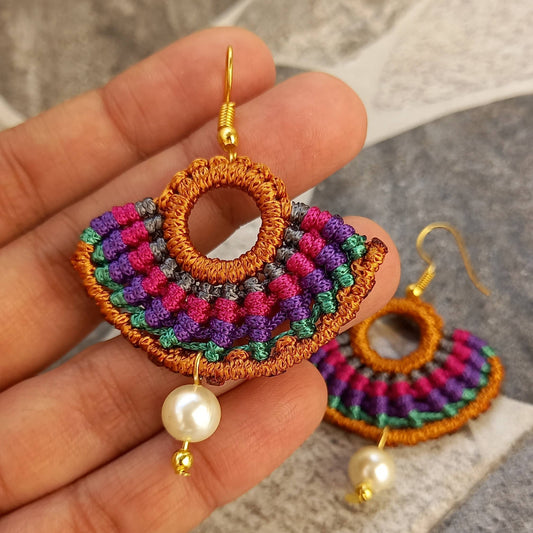 semicircular macrame dangler earrings with multiple colours and pearl beads