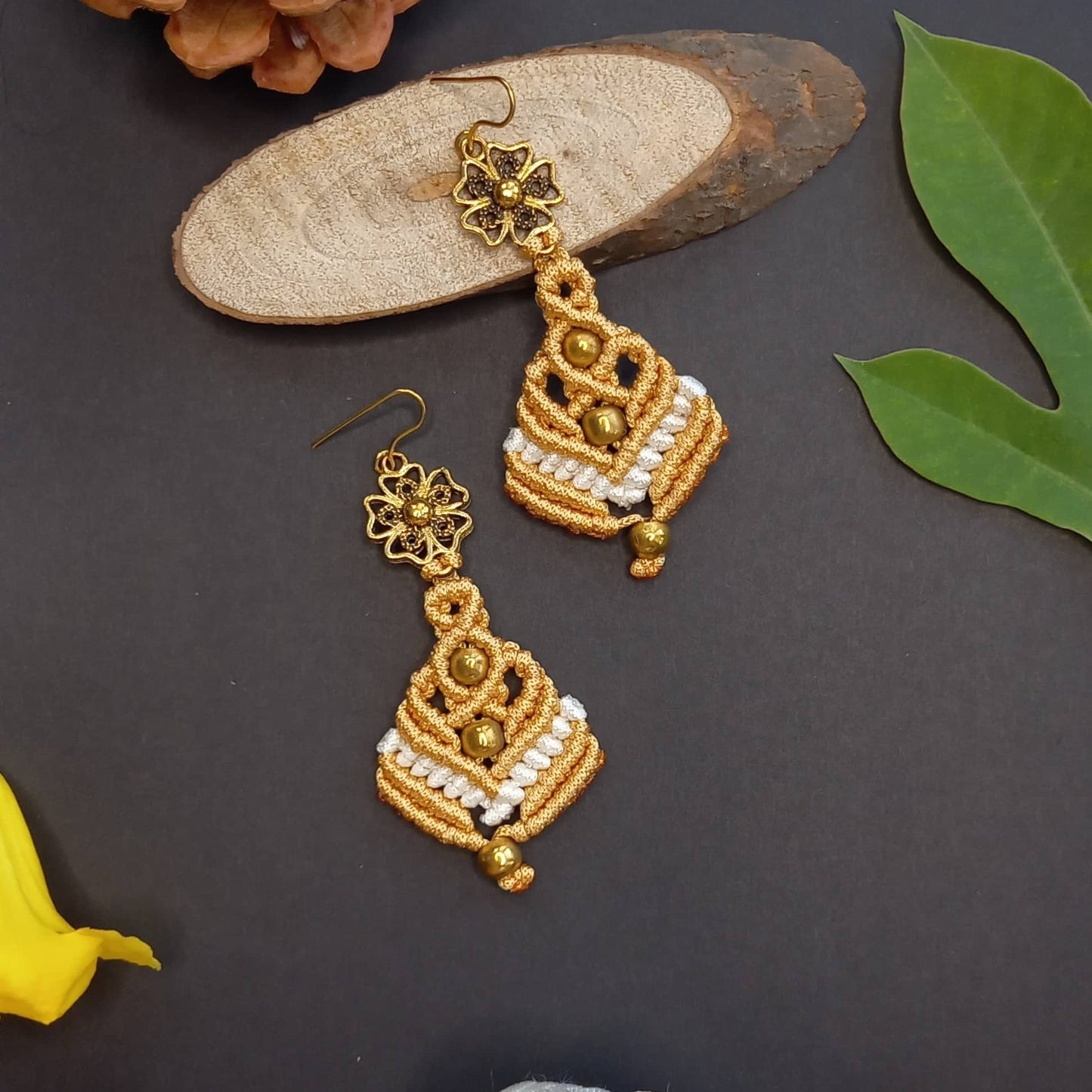 macrame dangler earrings with a floral connector and beads
