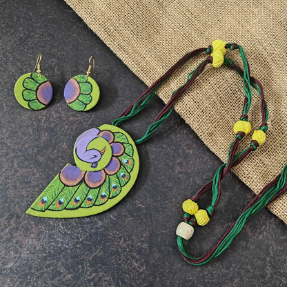 Alekhya fabric necklace set — green cotton pendant hand-painted with a peacock in blue, coral and green, with matching round dangler earrings