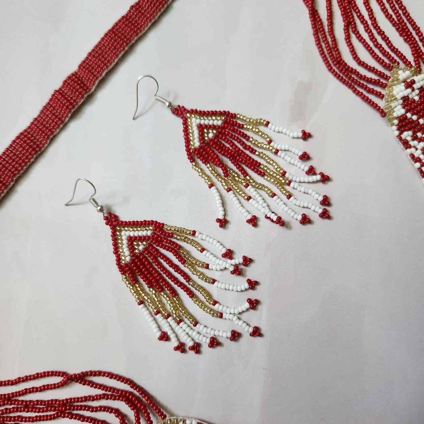 dark pink geometric necklace layered bead necklace for party dangler earrings for office wear haldi wedding wear necklace set