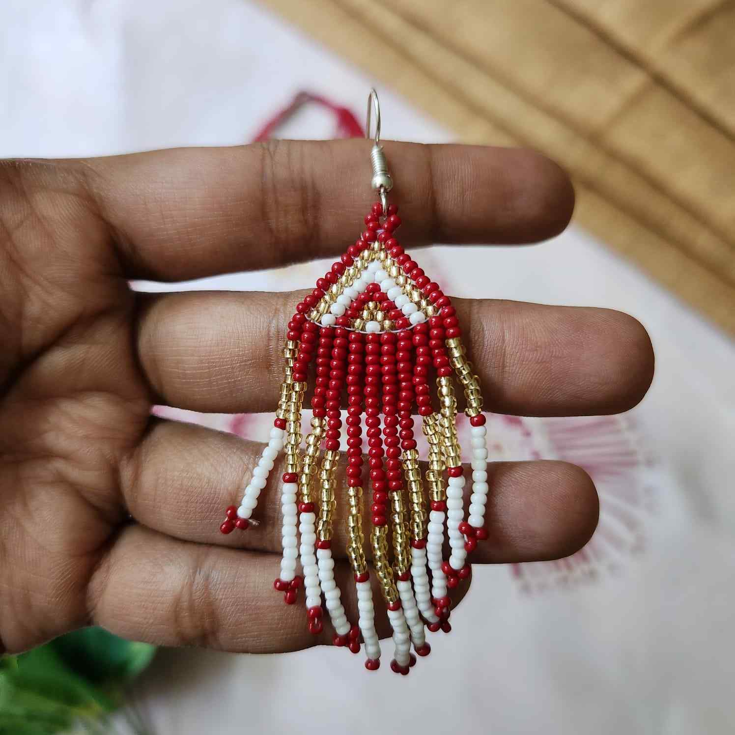 dark pink geometric necklace layered bead necklace for party dangler earrings for office wear haldi wedding wear necklace set