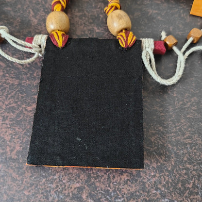 Mrinmayi orange fabric necklace set