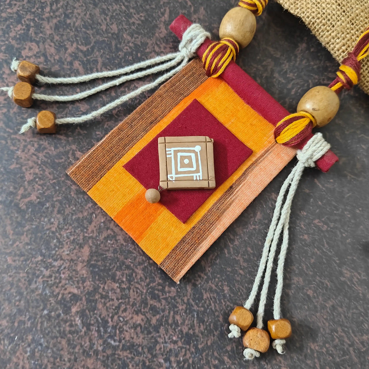 Mrinmayi orange fabric necklace set