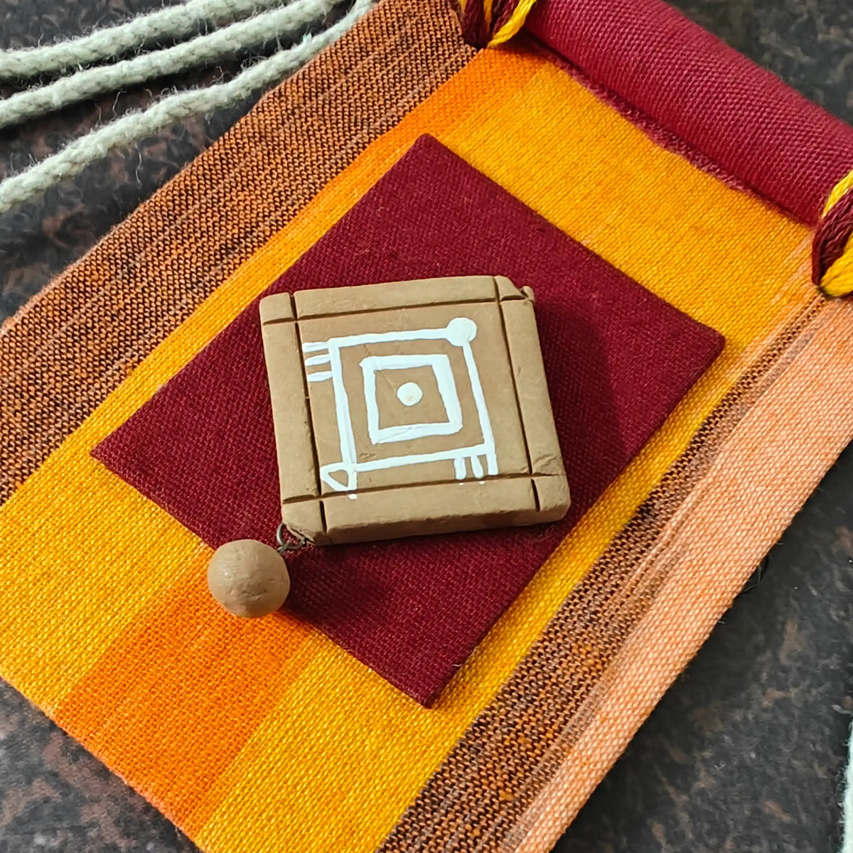 Mrinmayi orange fabric necklace set
