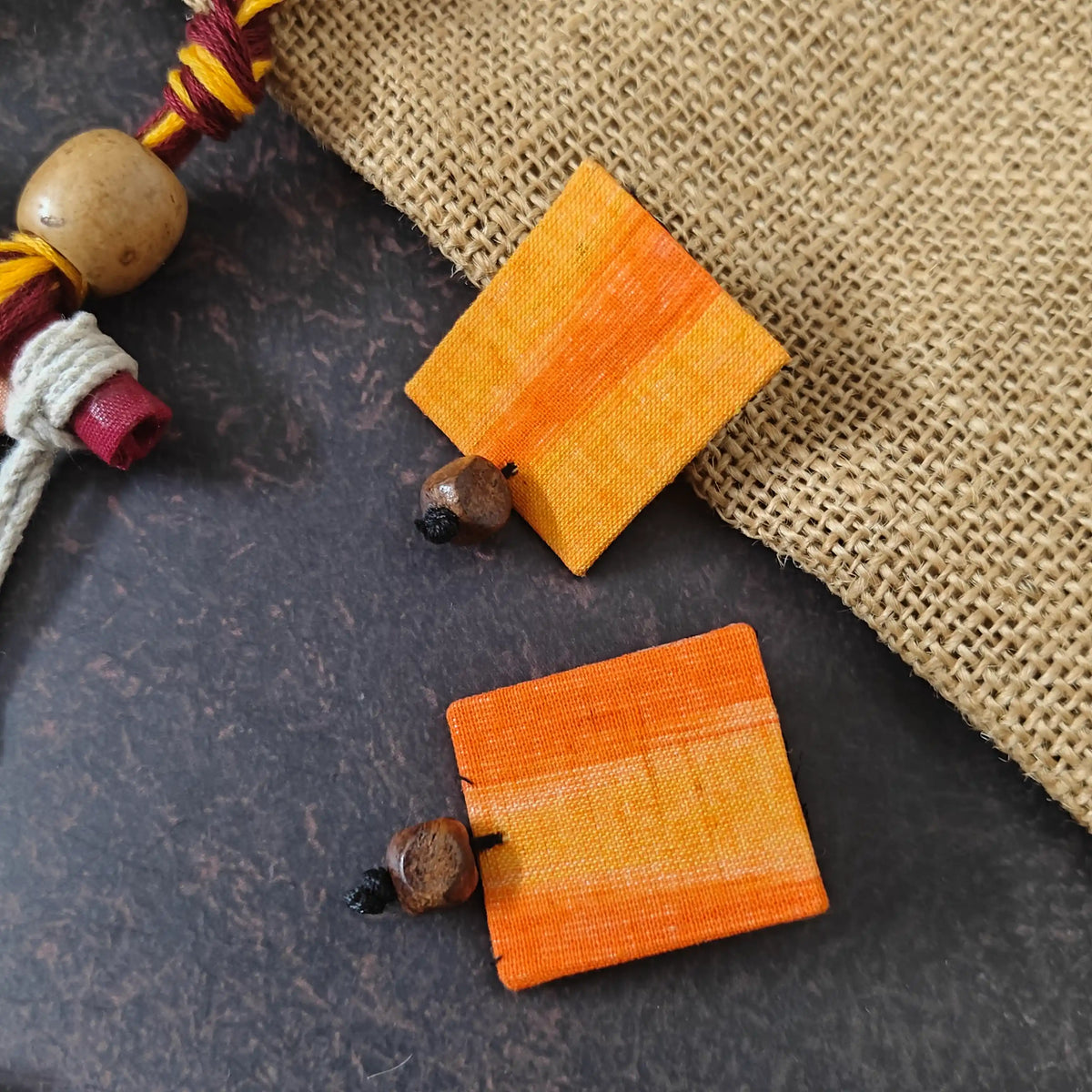 Mrinmayi orange fabric necklace set