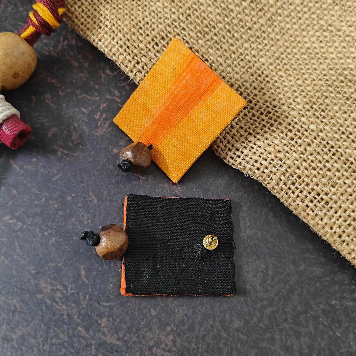 Mrinmayi orange fabric necklace set