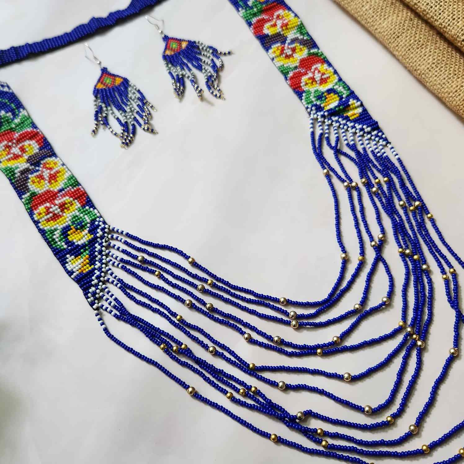 blue pansy floral necklace layered bead necklace for party dangler earrings for office wear haldi wedding wear necklace set