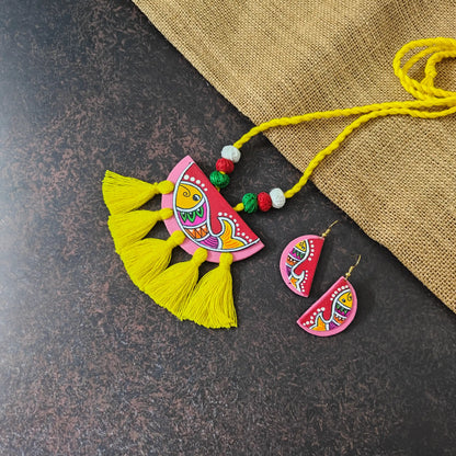 Pratima yellow fabric necklace set — semicircular pendant with a hand-painted fish and yellow cotton thread tassels, with small matching fish earrings