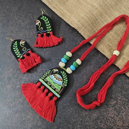Rangini red fabric necklace set — semicircular pendant with a hand-painted elephant and red cotton thread tassels, with matching semicircular earrings