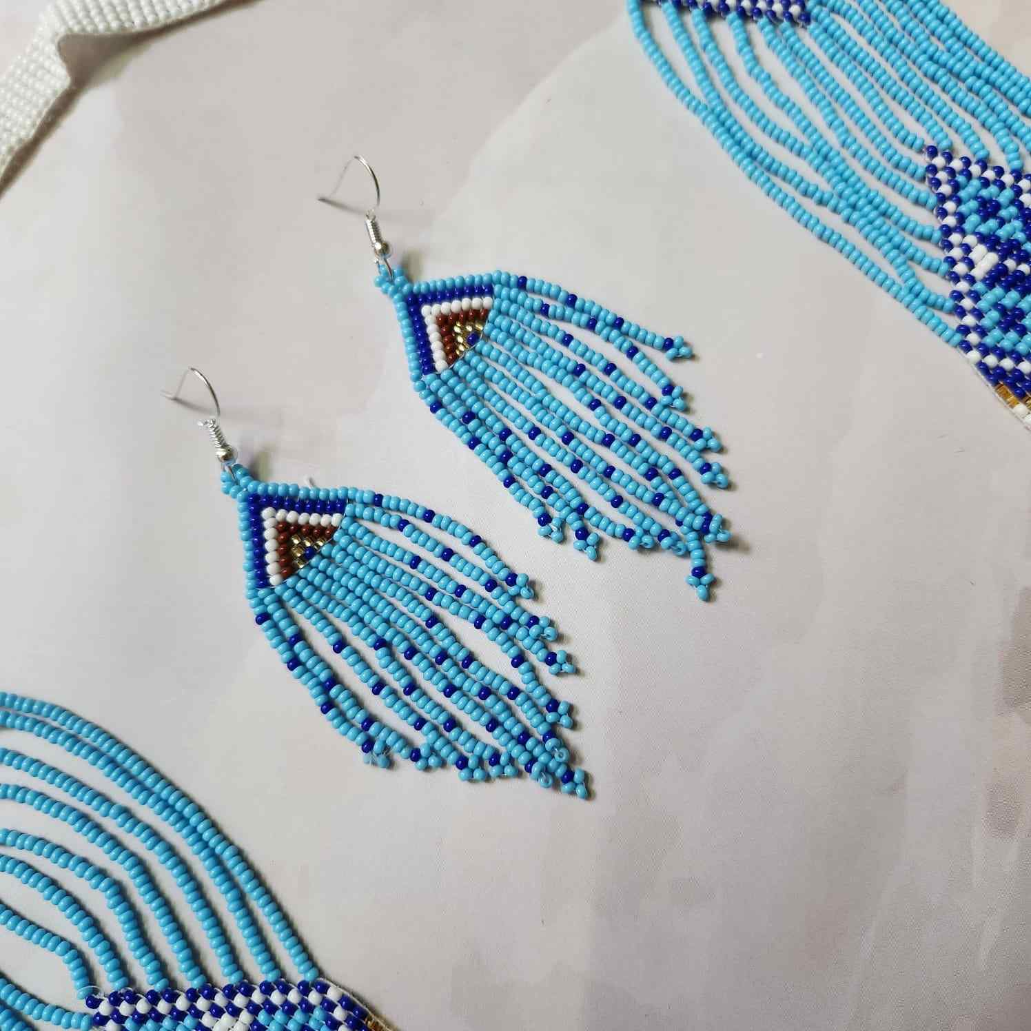 blue geometric necklace layered bead necklace for party dangler earrings for office wear haldi wedding wear necklace set