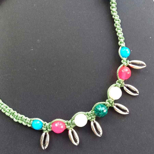 Kaparda silver cowrie macrame statement necklace