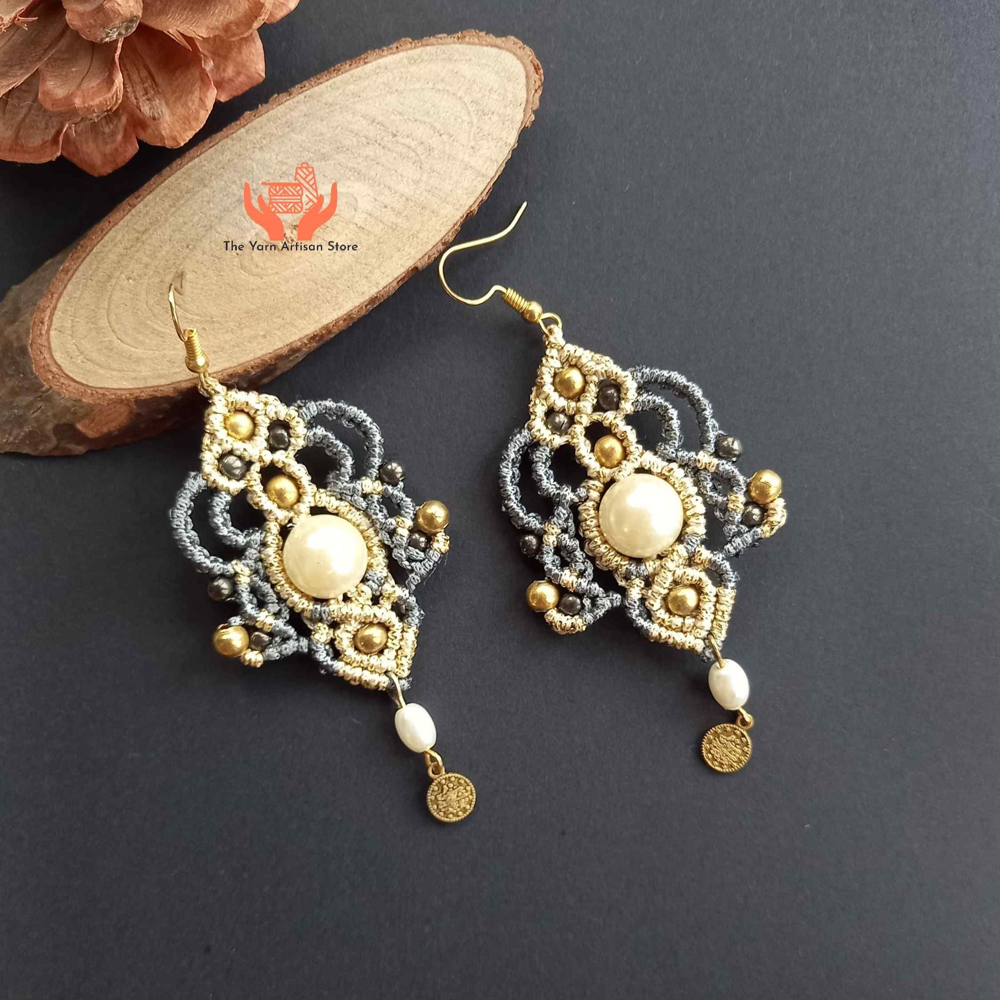 macrame dangler earrings with a pearl center and gold coin charm