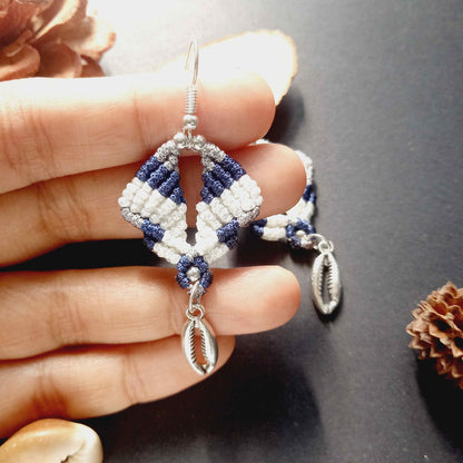 diamond shaped macrame earrings in three colours with a coil of rope charm