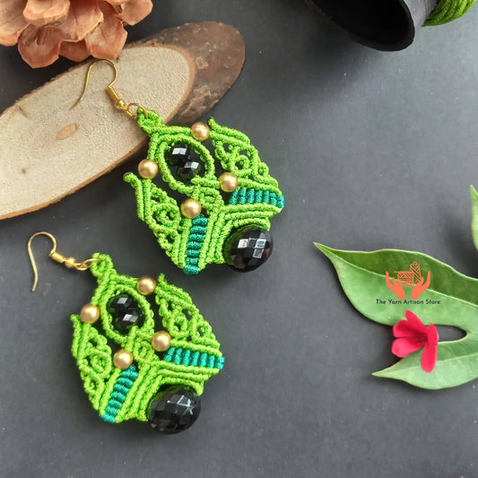 Macramé dangle earrings with black faceted focal beads