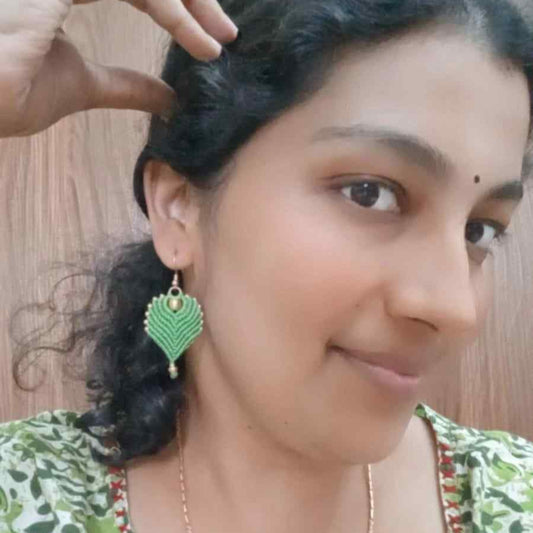 peacock feather earrings brass bead earrings leaf earrings light green earrings