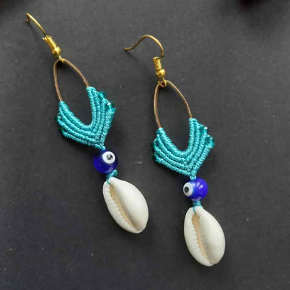 cowrie shell dangler earrings with evil eye bead