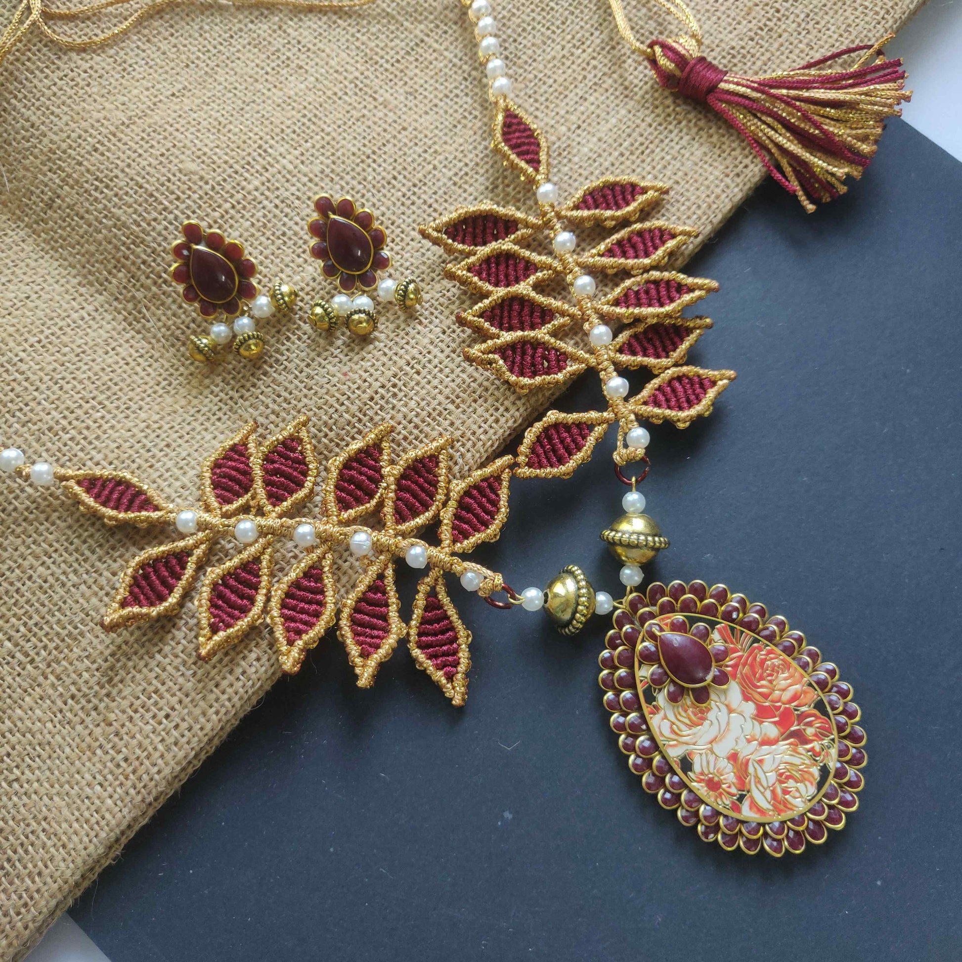 gold necklace leaf necklace set traditional gold necklace set maroon necklace set stud earrings drop pendant oval pendant set