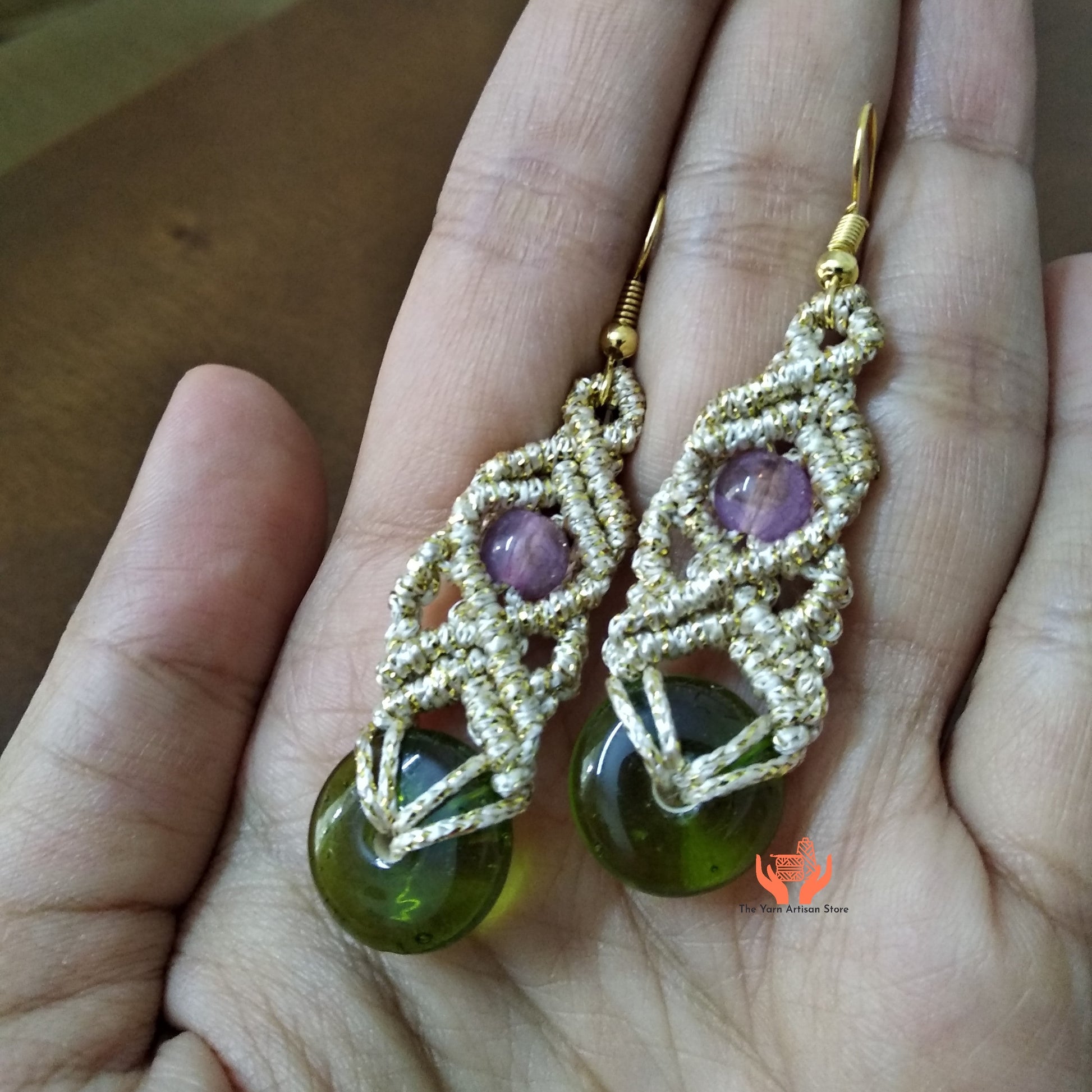 macrame dangler earrings with green doughnut beads