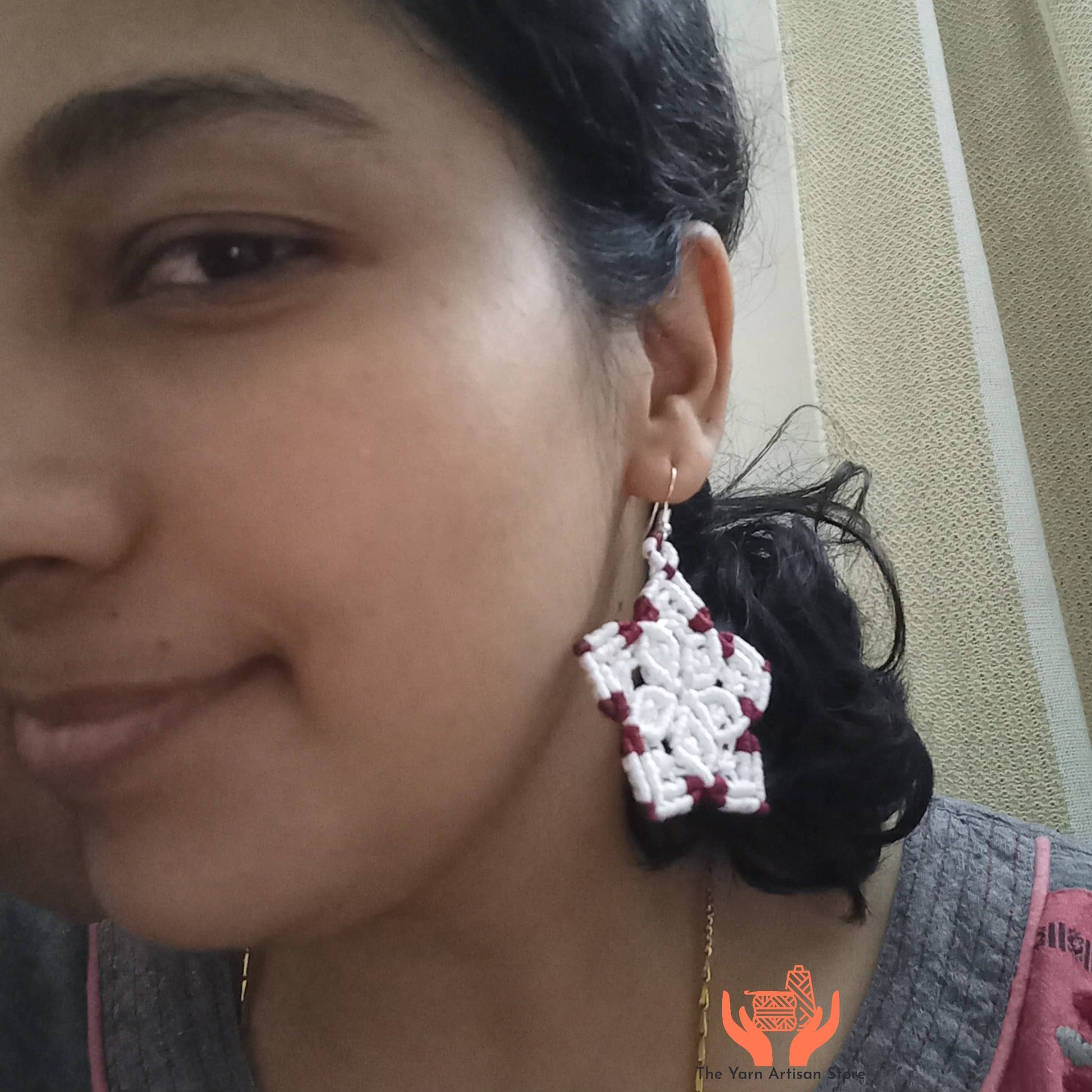 macrame five petalled floral dangler earrings in white and maroon
