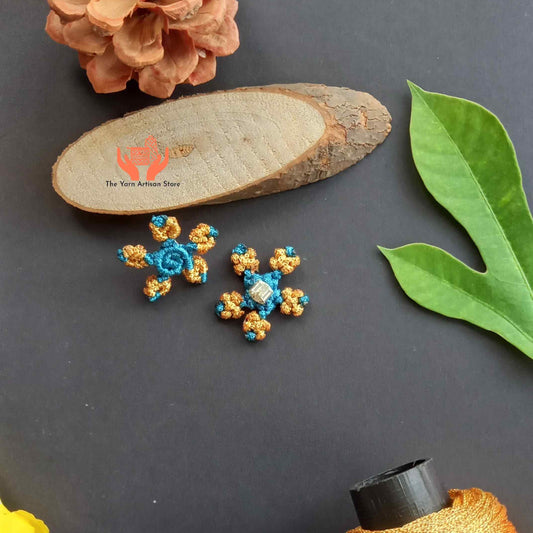 Macramé floral stud earrings in blue and gold