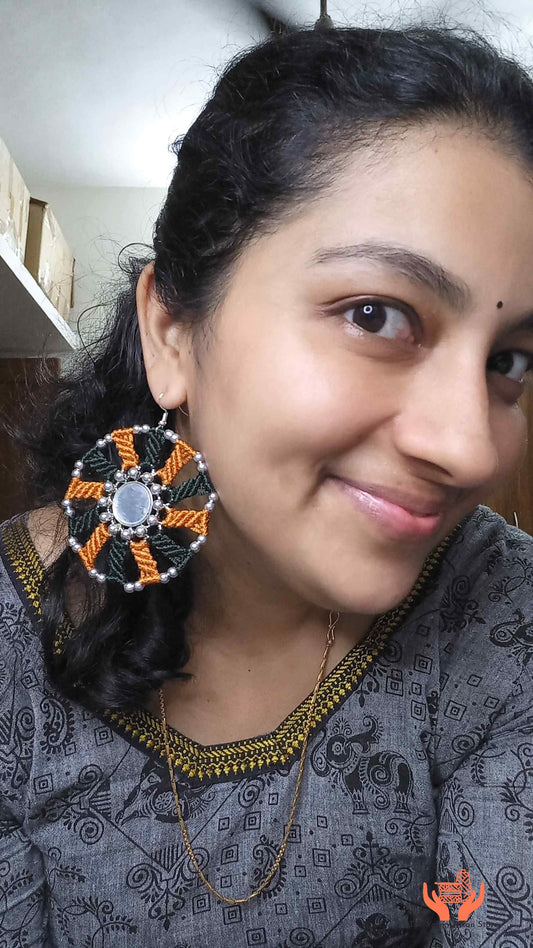 silver mirror earrings with macrame work in dark green and mustard
