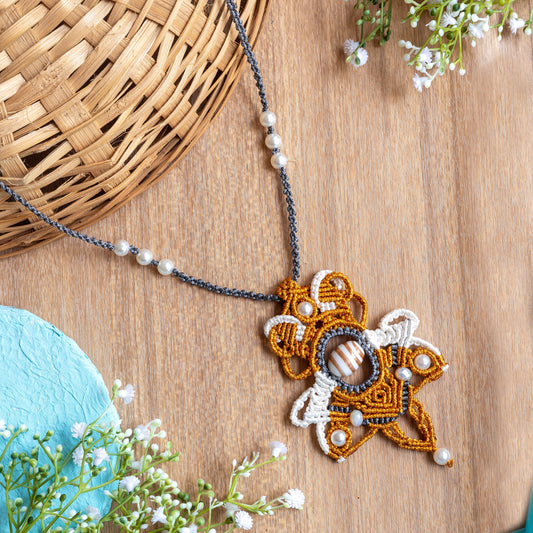 macrame statement necklace with a handmade lampwork bead center