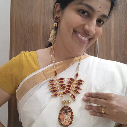 gold necklace leaf necklace set traditional gold necklace set maroon necklace set stud earrings drop pendant oval pendant set