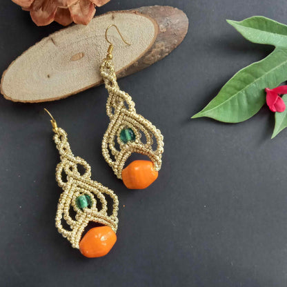 bead macrame dangler earrings with lotus petal design
