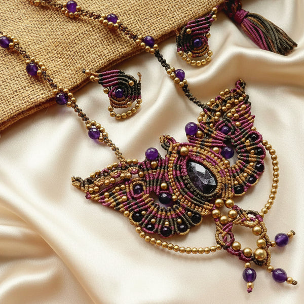 macrame pendant earrings set in the shape of a butterfly featuring amethyst stones and agate beads
