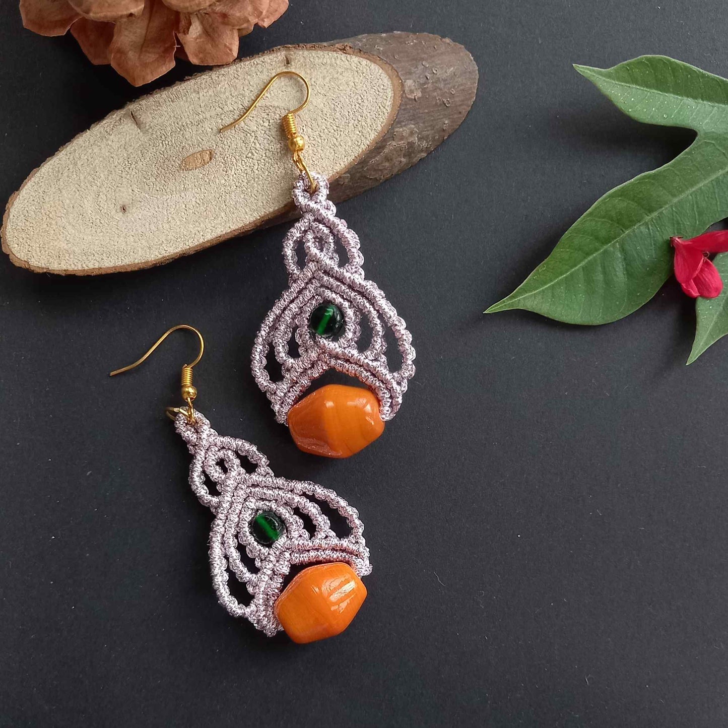 bead macrame dangler earrings with lotus petal design