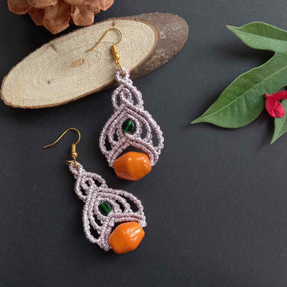 bead macrame dangler earrings with lotus petal design
