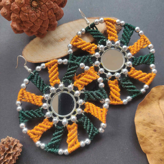 silver mirror earrings with macrame work in dark green and mustard